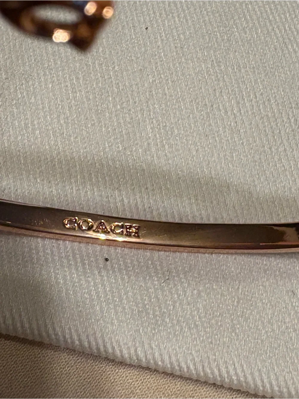 Coach Rose Gold Crystal Pavé Hinged Bangle with 'C' Charm